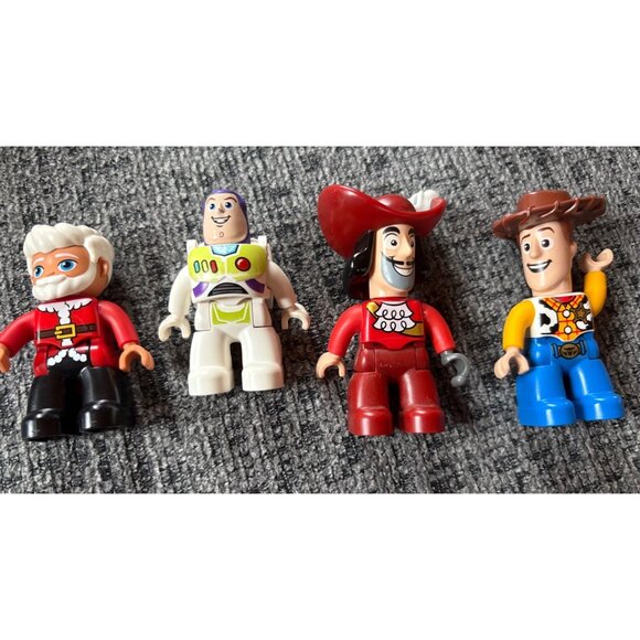 Set Of 4 LEGO Duplo Figures: Santa Claus Buzz Lightyear Captain Hook & Woody Cha - Picture 1 of 6